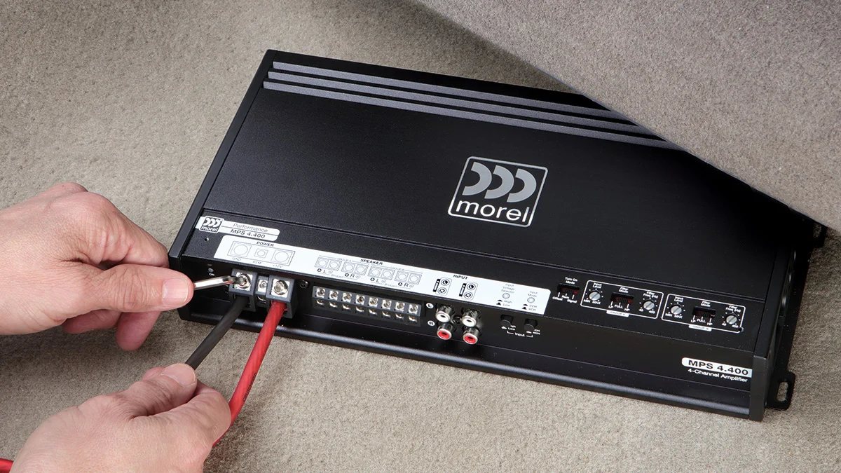Car amplifier being wired during installation