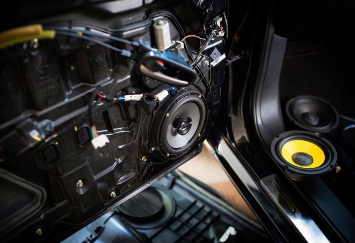 New speakers being installed in a car door