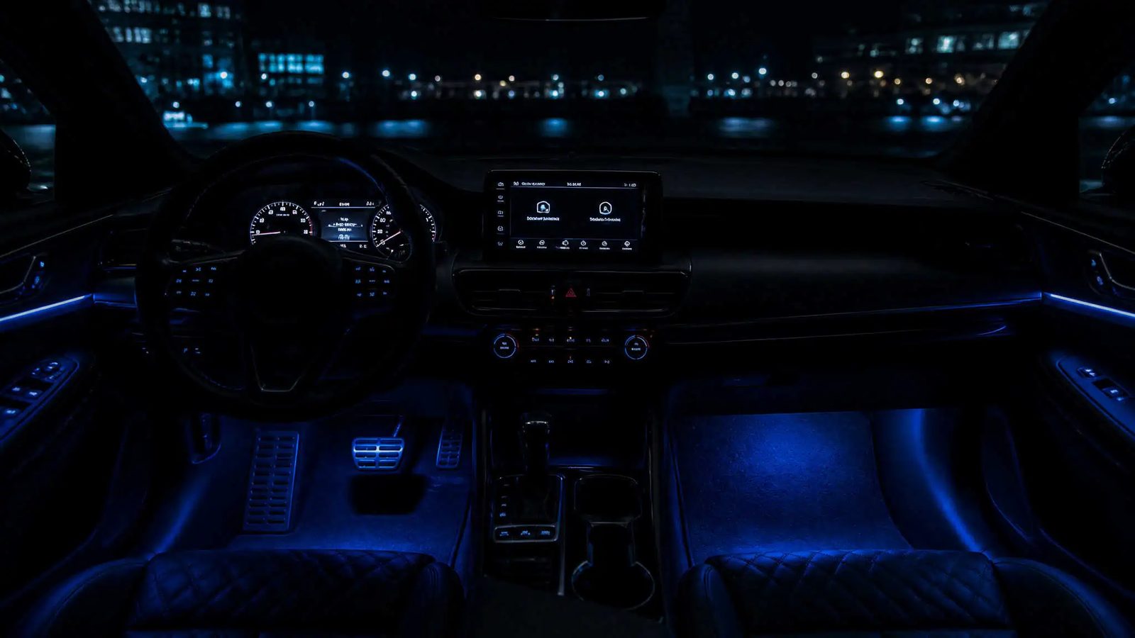 Blue LED ambient lighting glowing inside a car at night